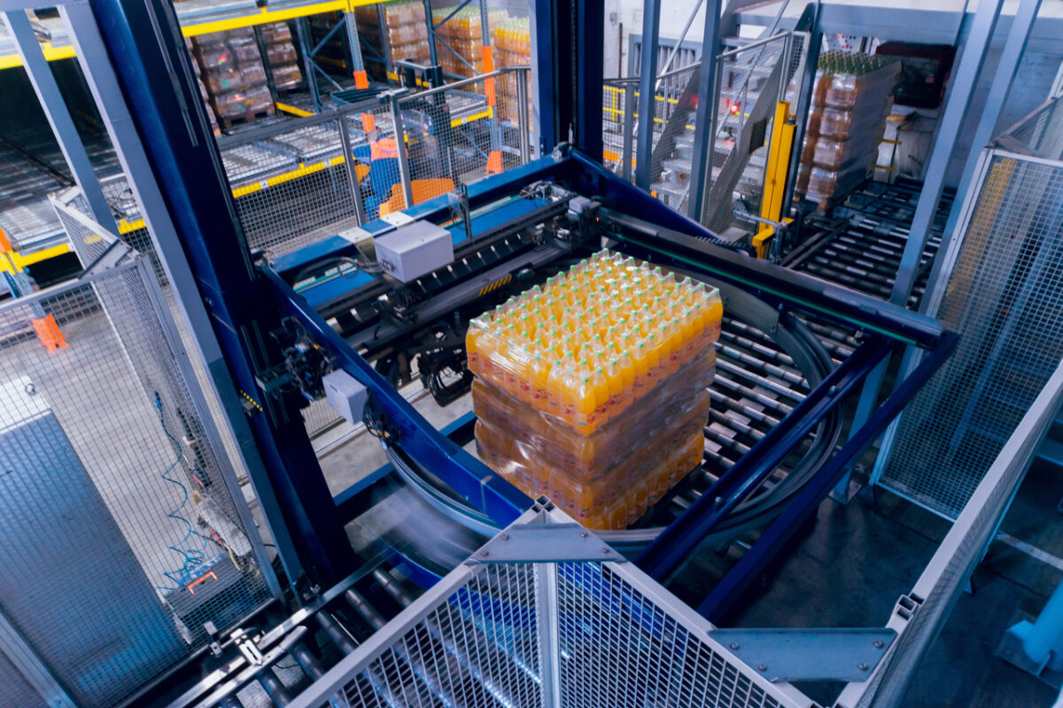 Picture of food products in a metal conveyor in a factory